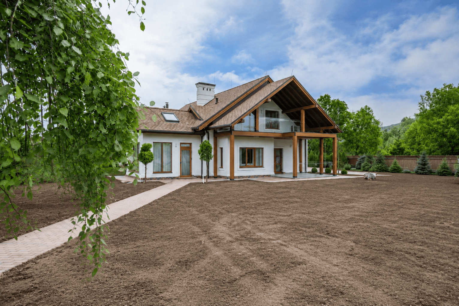 Patchy backyard before hydroseeding