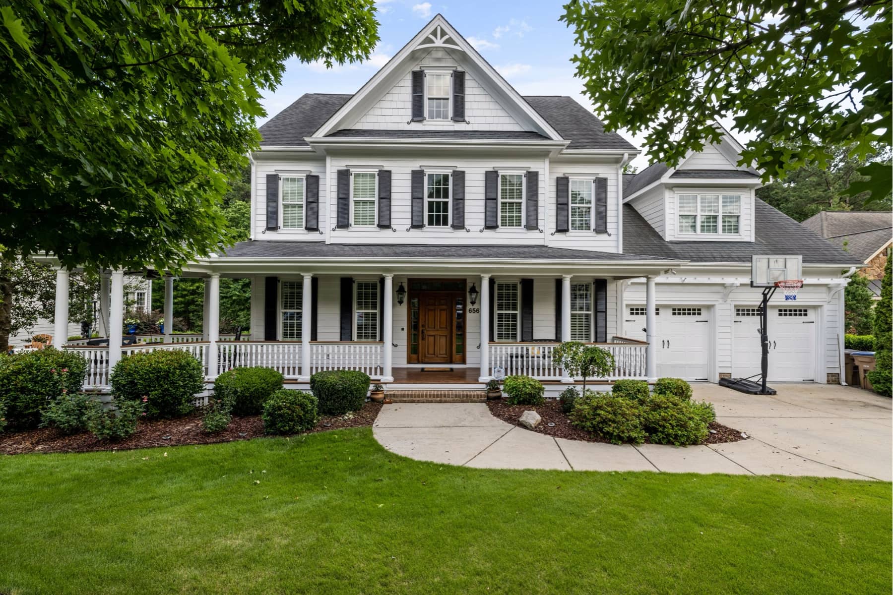 New lawn beginning to grow beside a home